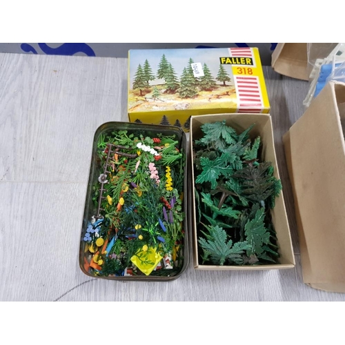 119 - MIXED ITEMS INCLUDES BRITAINS FLORAL GARDEN SET,  FALLER 318 PLASTIC MODEL TREES WITH 3 LESNEY DIECA... 