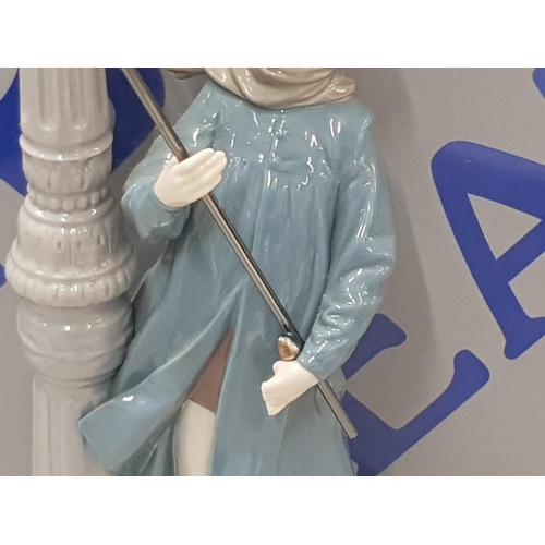 12 - LLADRO FIGURE 5205 LAMPLIGHTER SIGNED AND DATED TO BASE SAS