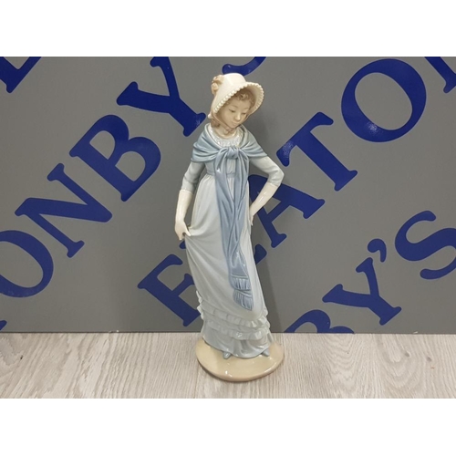 14 - NAO BY LLADRO FIGURE OF A LADY WEARING LONG BLUE DRESS AND BONNET SAS