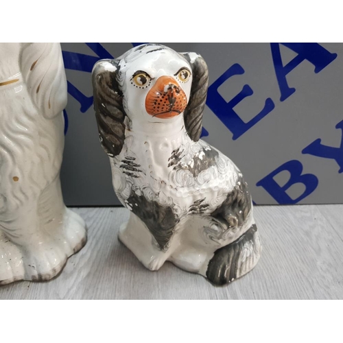 181 - 2 POTTERY STAFFORDSHIRE STYLE DOGS