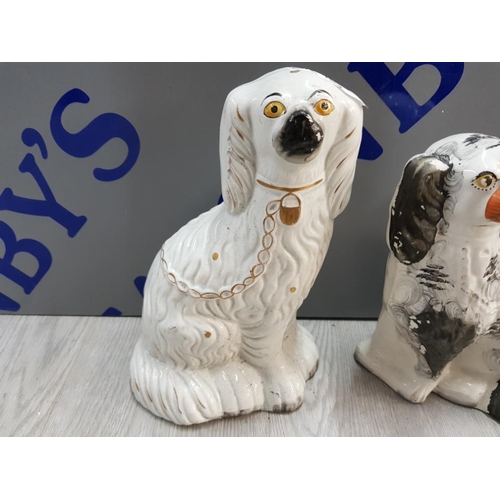 181 - 2 POTTERY STAFFORDSHIRE STYLE DOGS