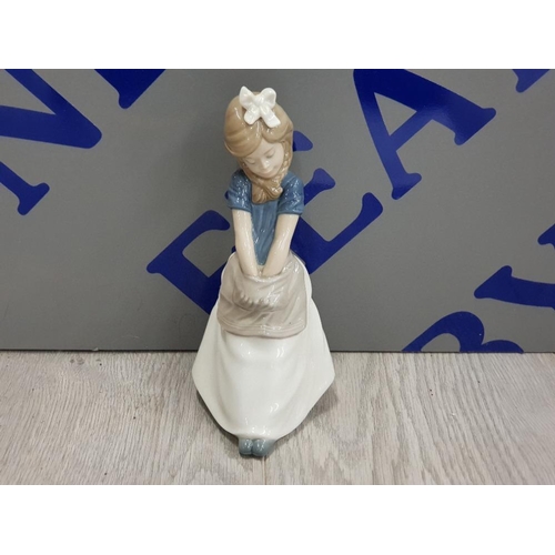 20 - NAO BY LLADRO FIGURE OF A DAYDREAMING GIRL WITH HANDS IN APRON POCKET