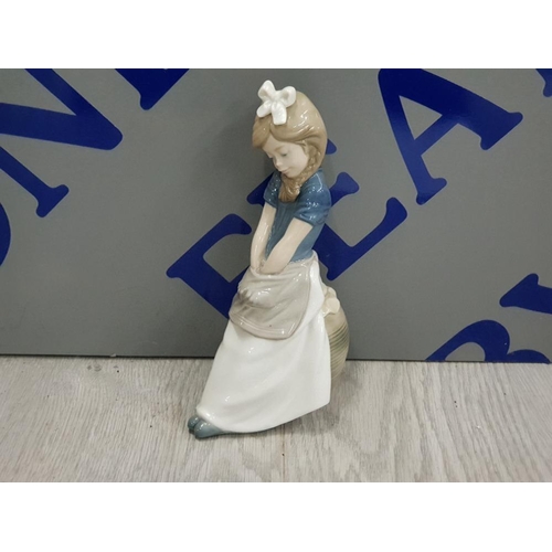 20 - NAO BY LLADRO FIGURE OF A DAYDREAMING GIRL WITH HANDS IN APRON POCKET