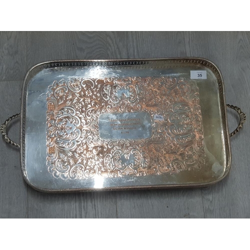 35 - MIXED ITEMS INCLUDING FLAT 50 FOOT HOSE, MULTIPURPOSE SPIRIT LEVEL AND WHITE METAL SERVING TRAY