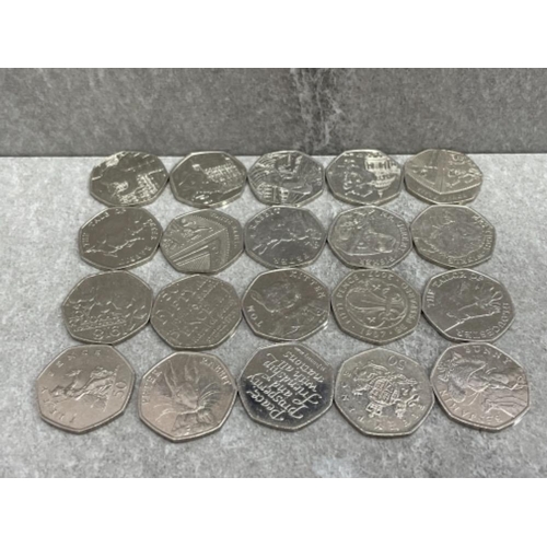 460 - 20 X COLLECTABLE 50P COINS INCLUDING PETER RABBIT PADDINGTON BEAR & OTHERS