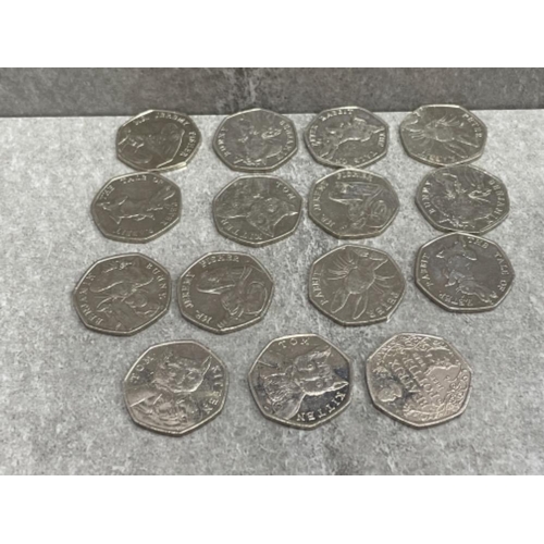 463 - 15 X COLLECTABLE 50P COINS INCLUDING DIFFERENT DATE PETER RABBIT TOM KITTEN & OTHERS