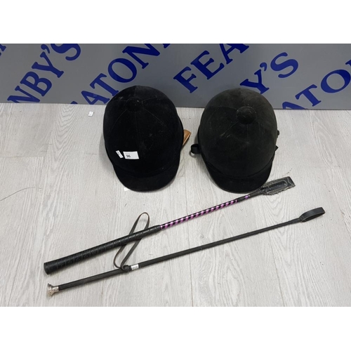 96 - 2 HORSE RIDING HELMETS SIZE 56 AND 2 WHIPS