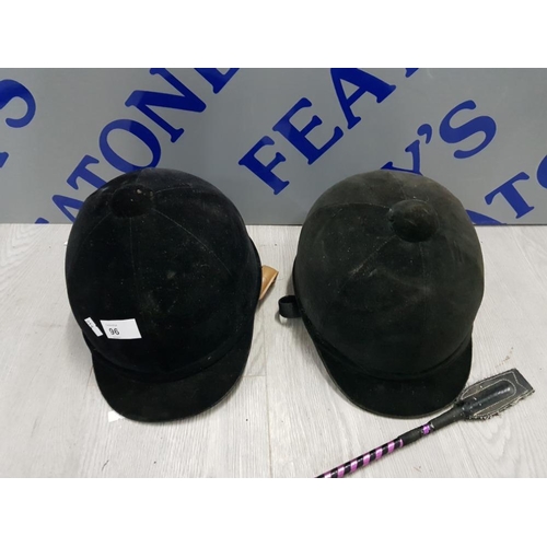 96 - 2 HORSE RIDING HELMETS SIZE 56 AND 2 WHIPS