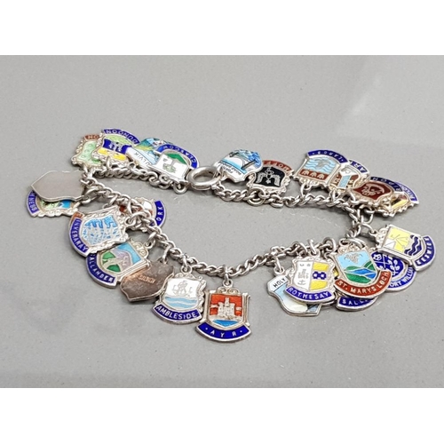 46 - SILVER BRACELET WITH ASSORTED SILVER AND ENAMEL SHIELD CHARMS 41G GROSS