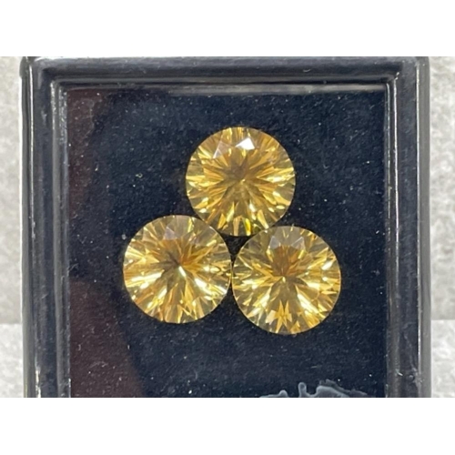 183 - THREE ROUND NATURAL BRAZILIAN CITRINES 10.30CTS