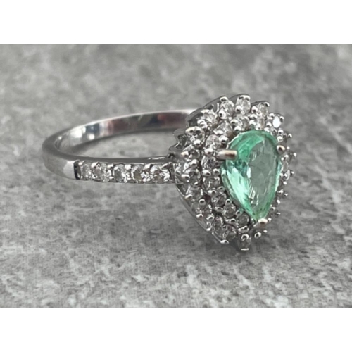 231 - 18CT WHITE GOLD PEAR SHAPE EMERALD WITH DOUBLE BORDER OF 36 DIAMONDS IN CLUSTER AND 10 DIAMONDS ON T... 