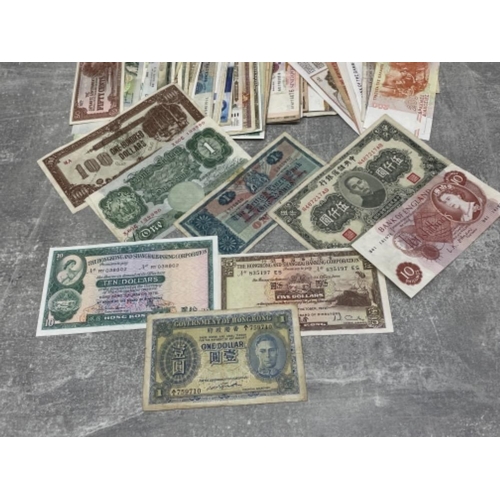 246 - BANKNOTES WORLD MIXTURE OF 115 MIXED GRADES INCLUDES HONG KONG CHINA AND JAPAN