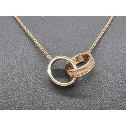 256 - CARTIER 18CT ROSE GOLD DIAMOND SET LINKED OVAL LOVE RING PENDANT AND CHAIN