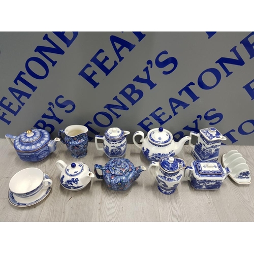 110 - COLLECTION OF RINGTONS TEA POTS AND MILK JUGS, ALSO TO INCLUDE CUP AND SAUCER AND TOAST RACK ETC