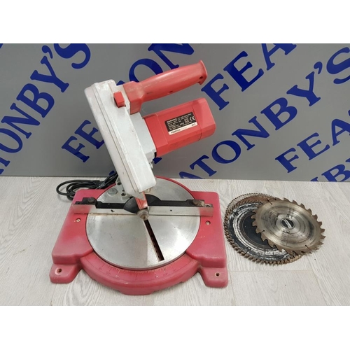 104 - MITRE SAW POWER DEVIL WITH SPARE BLADES