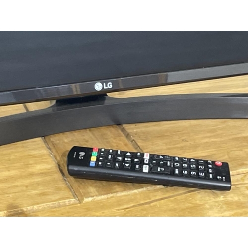 141 - LG 42 INCH TV WITH REMOTE