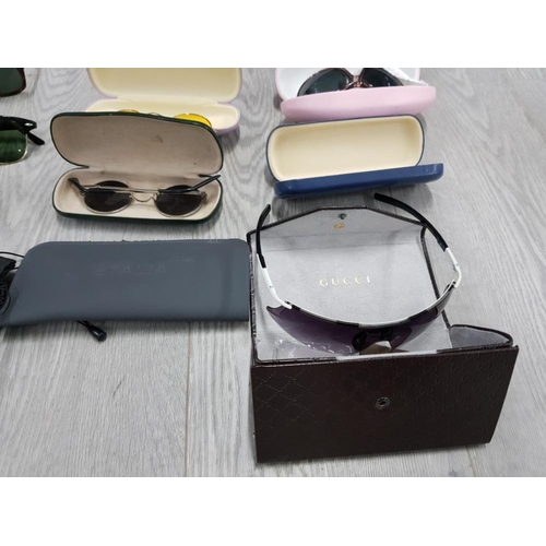 85 - 14 PAIRS OF DESIGNER SUNGLASSES IN CASES INCLUDES 3 PAIRS OF RAY-BANS, OCCHIALI AND A PAIR OF OAKLEY... 