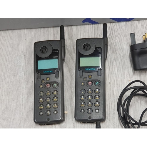 93 - 2 VINTAGE SIEMENS PHONES WITH CHARGER