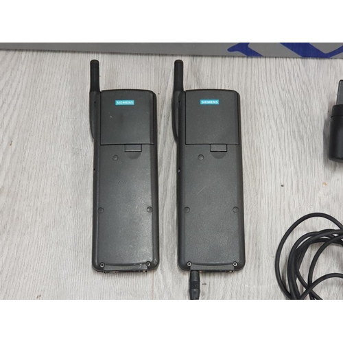 93 - 2 VINTAGE SIEMENS PHONES WITH CHARGER