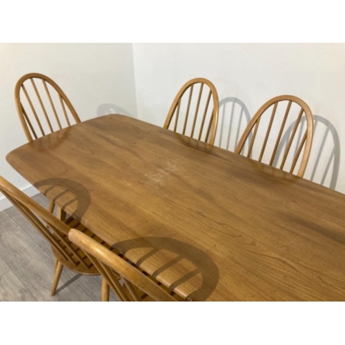 304 - RETRO ORIGINAL ERCOL DINING ROOM SUITE TABLE AND 6 QUAKER CARVERS 150CM BY 74CM BY 71CM