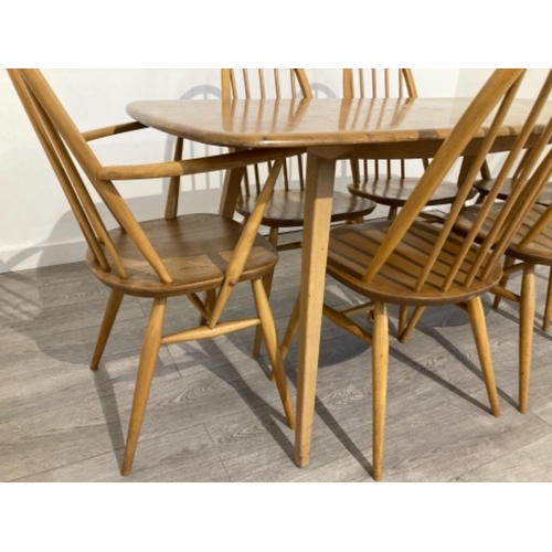 304 - RETRO ORIGINAL ERCOL DINING ROOM SUITE TABLE AND 6 QUAKER CARVERS 150CM BY 74CM BY 71CM