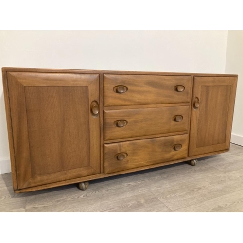 305 - LARGE VINTAGE ERCOL LIGHT ELM WOOD SIDEBOARD WITH ORIGINAL BLUE LABEL 155 BY 44CM BY 69CM