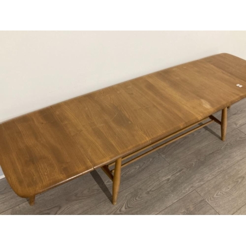 306 - ERCOL DROP LEAF COFFEE TABLE WITH MAGAZINE RACK ORIGINAL BLUE LABEL