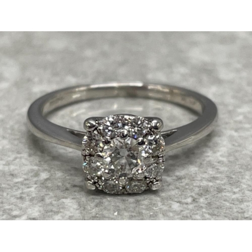 317 - DIAMOND CLUSTER SOLITAIRE RING 9CT WHITE GOLD