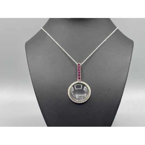 1 - Silver and ruby magnifying glass pendant and chain