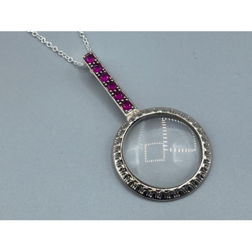 1 - Silver and ruby magnifying glass pendant and chain