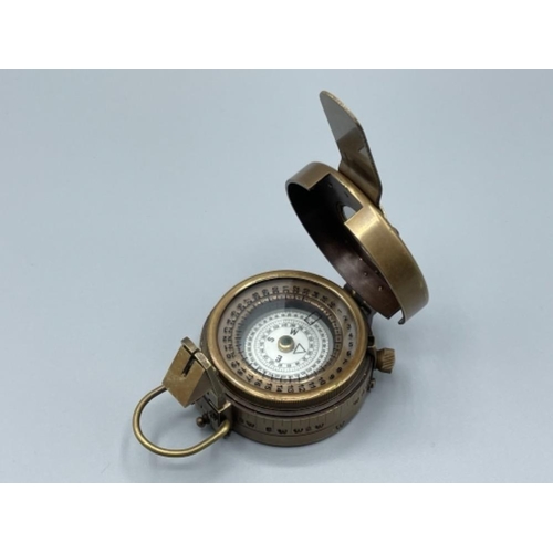 20 - Brass cased military style compass