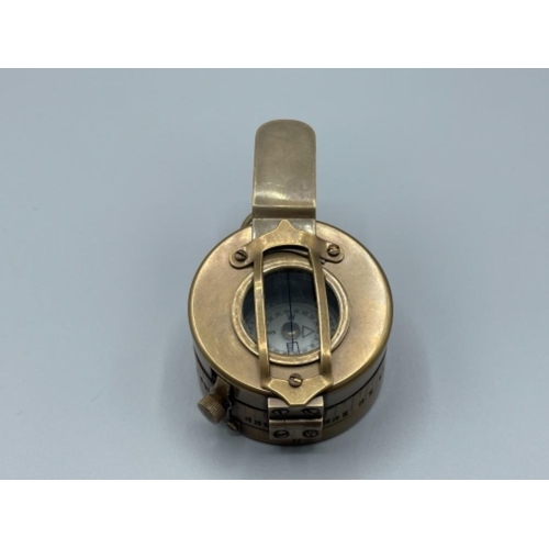 20 - Brass cased military style compass