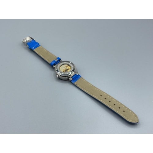 31 - Steel cased wristwatch on blue leather strap