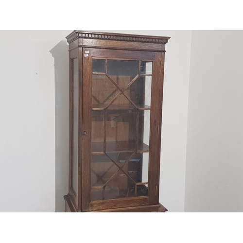 388 - Tall narrow 1930s display cabinet, with glazed display top section and storage cupboard below, 58x59... 