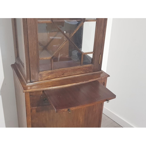 388 - Tall narrow 1930s display cabinet, with glazed display top section and storage cupboard below, 58x59... 