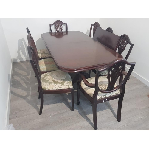 391 - Large extending mahogany dining table and 8 shield back chairs, 2 carvers 6 singles with extra leaf,... 