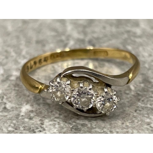 141 - 18ct gold, platinum and diamond 3 stone ring. 2.5G size