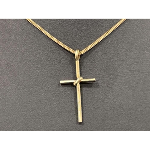 181 - 9ct gold Cross and chain 5.2g