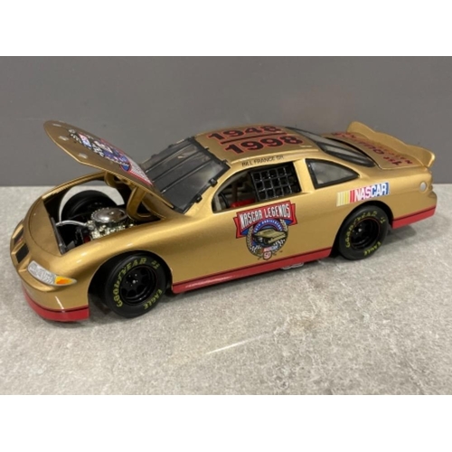 219 - NASCAR 50th anniversary NASCAR Legends car and coin