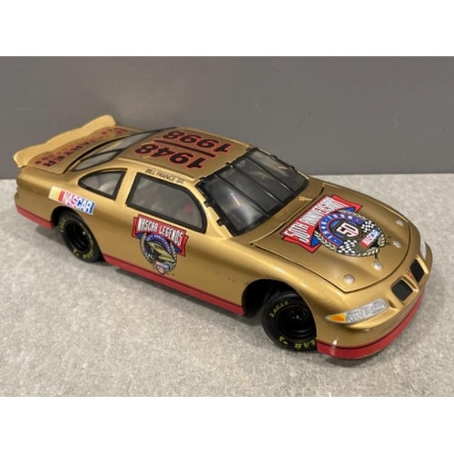 219 - NASCAR 50th anniversary NASCAR Legends car and coin