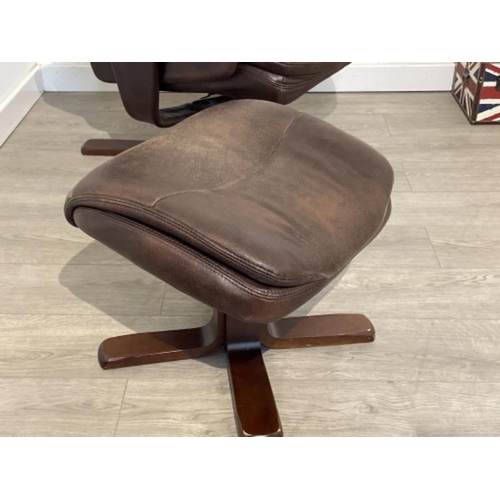 25 - Leather stressless style arm chair and foot stool