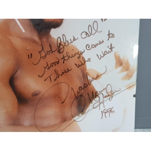 254 - Unframed Marvelous Marvin Hagler picture, signed by the boxing legend along side 