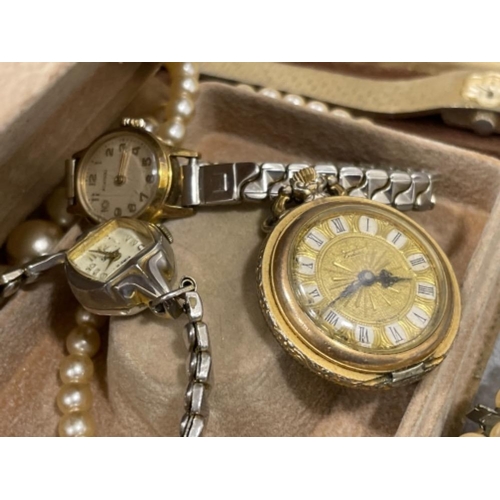 56 - Ladies watches and 2 paperweights