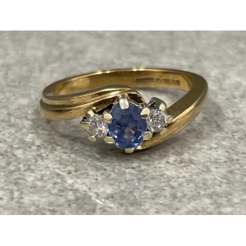 72 - 9ct gold diamond and sapphire twist ring. 3.5G size K