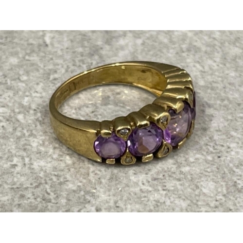 76 - Ladies 9ct gold 5 stone amethyst and diamond ring. 3.5G size J