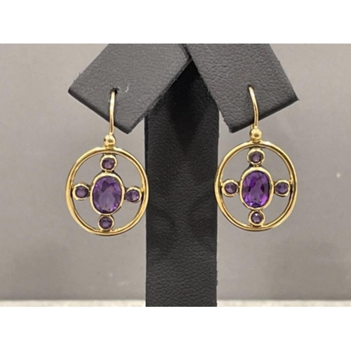 79 - Ladies 9ct antique gold ornate amethyst drop earrings
