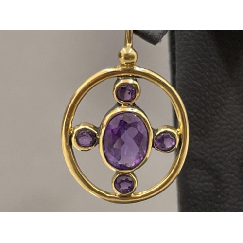 79 - Ladies 9ct antique gold ornate amethyst drop earrings