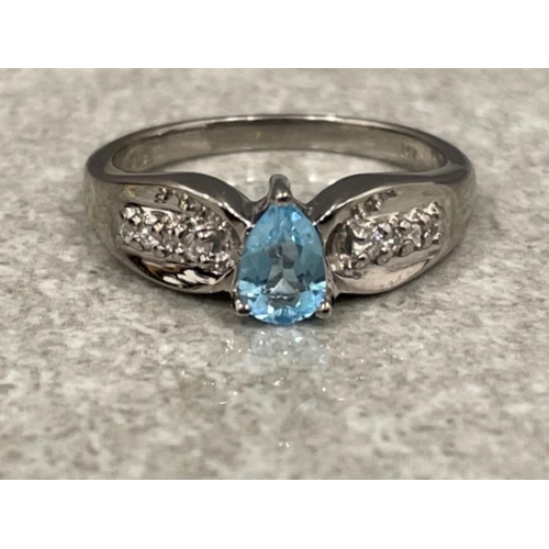 80 - Ladies 14ct white gold blue stone and diamond ring. 3.6g size N