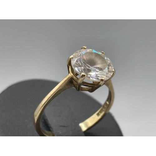 32 - Ladies 9ct gold CZ solitaire ring. 2.9g size O1/2