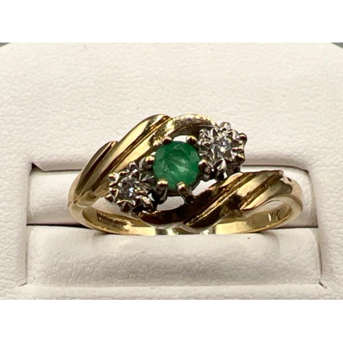 143 - 9ct gold diamond and emerald ring. Size N 2.4g